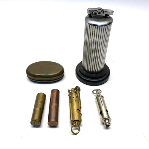 Polo lighter, WWI lighters and a snuff box.