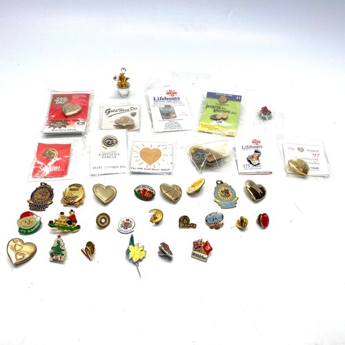 596 - collection of enamel pin badges.