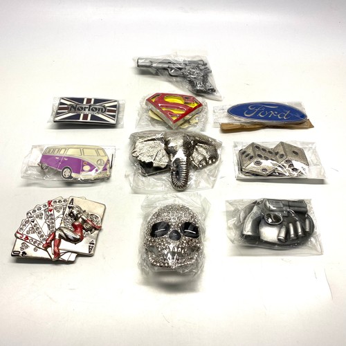 604 - Collection of new belt buckles.