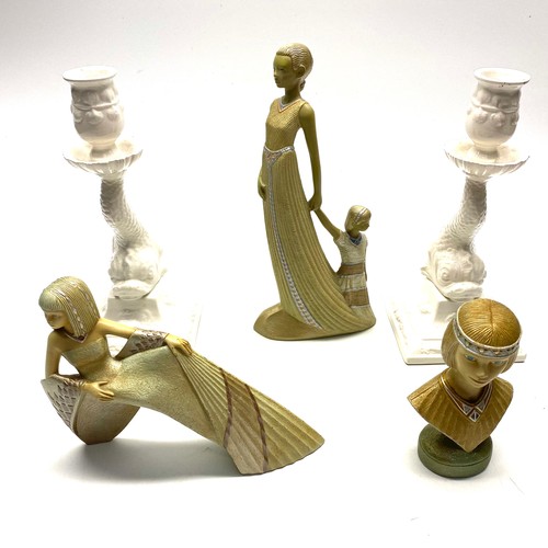 605 - Ivory princess figures and Neptune candle sticks.