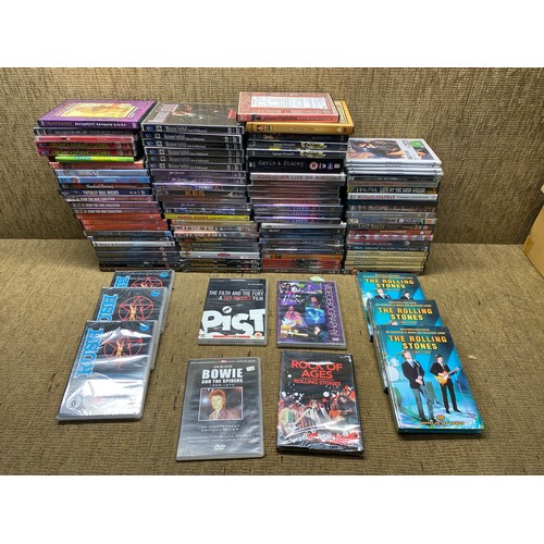 186 - Large selection of music DVDs including: The Rolling Stones, Rush and Simon & Garfunkel.