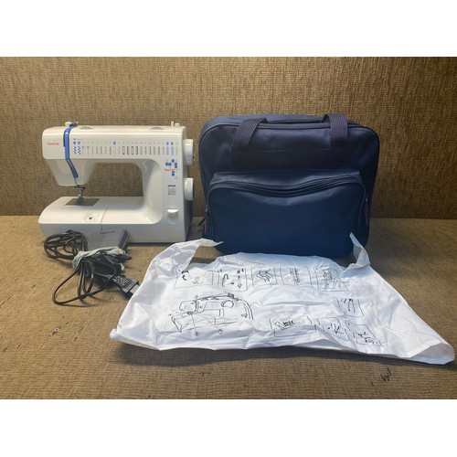 446 - Toyota quilt master sewing machine with electronic pedal.