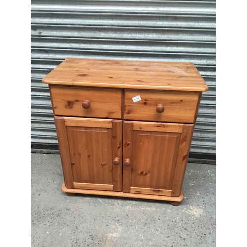 310F - Pine storage cupboard with two drawers