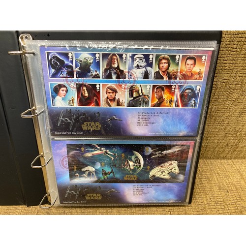 453 - Three folders of first day covers including star wars with COAs.