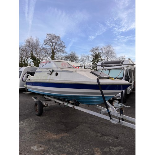 983 - Bayliner Capri speed boat/cruiser and Mariner engine (untested). Comes complete with boat trailer. P...