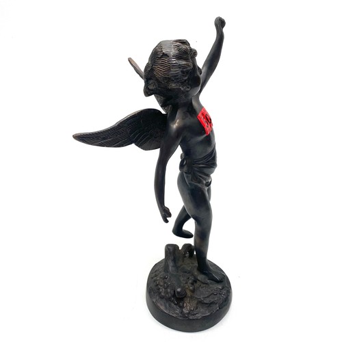 502 - Bronze Cupid Sculpture Raised on a Circular Base Early 20th Century; 25cm Tall.