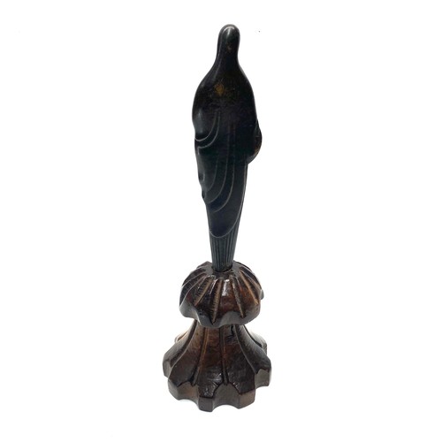 507 - Bronze figure of Mother Mary mounted on a arts and crafts wooden base.