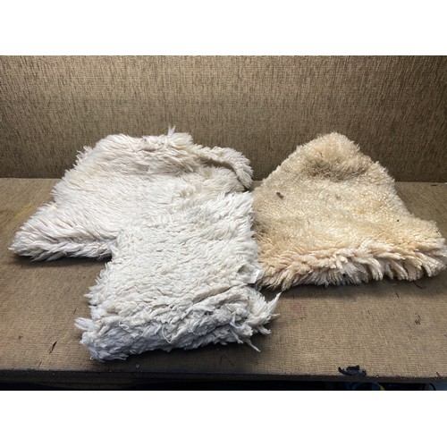 75 - Vintage original sheepskin rugs.