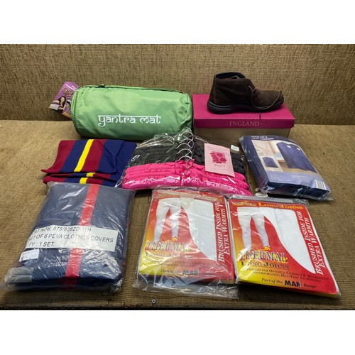 87 - Mixed items including: Pair of shoes, thermal clothing and a Yantra mat.