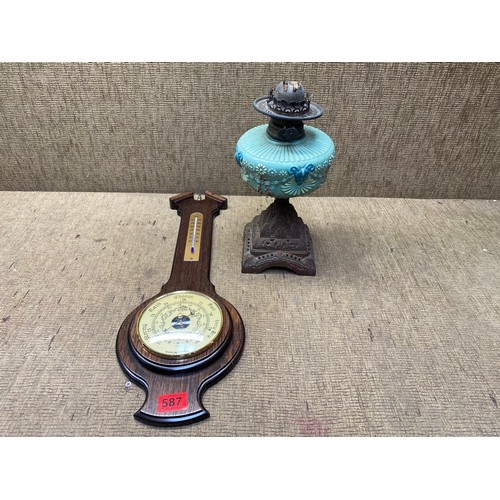 587 - Vintage barometer and oil lamp.