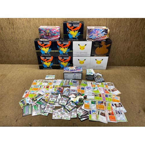 939 - Large selection of Pokémon cards and box sets.