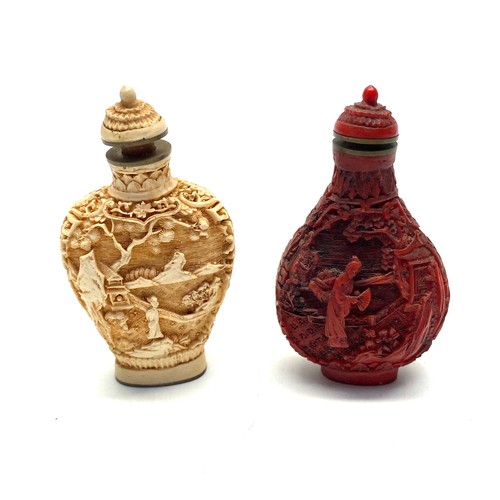 579 - 2 Chinese cinnabar scent bottles.