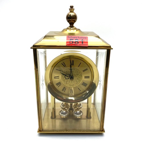 581 - Brass clock by Acctim. (working)