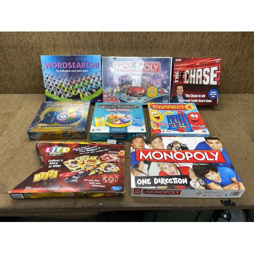 104 - Selection of mixed board games retail package.