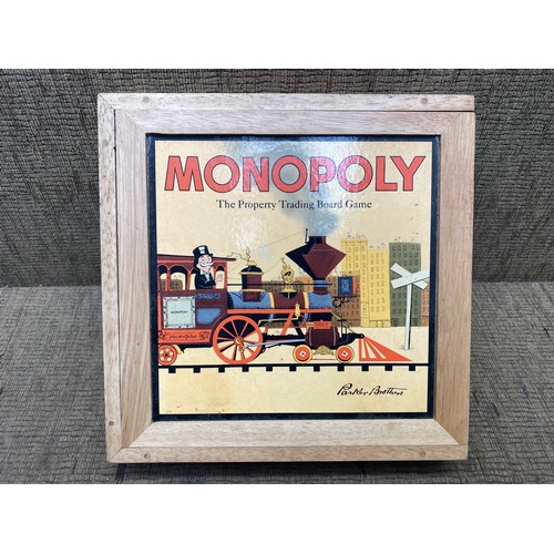 943 - Vintage nostalgia games series Parker brothers 2001 monopoly in a wooden box.