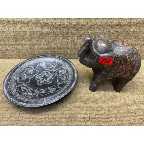 594 - Hand carved wooden bowl from Kenya and a hand carved elephant.