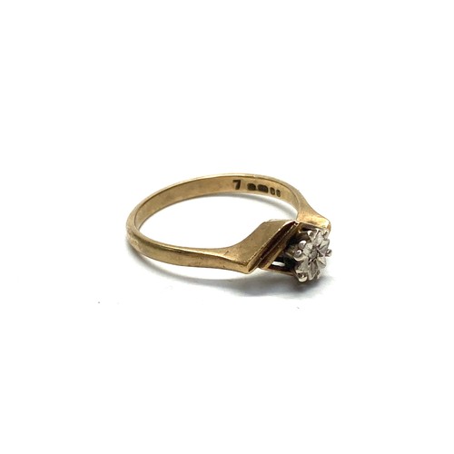 768 - 9ct gold ring with good diamond and interesting mount size P, 2.6g.