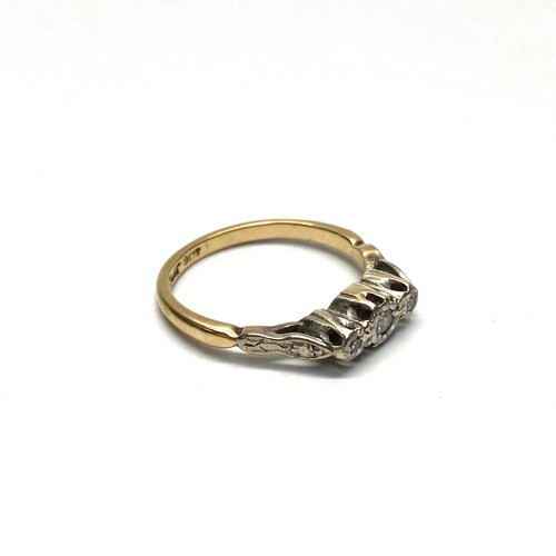 771 - 9ct gold ring with three diamonds and a platinum mount size L. 2g.