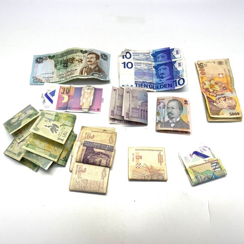 603 - Large selection of foreign bank notes.