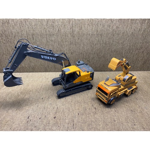 986 - Volvo ec160e excavator and a simulating a trufstylf.