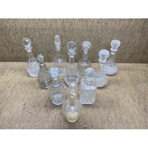 465 - 10 crystal whiskey decanters.