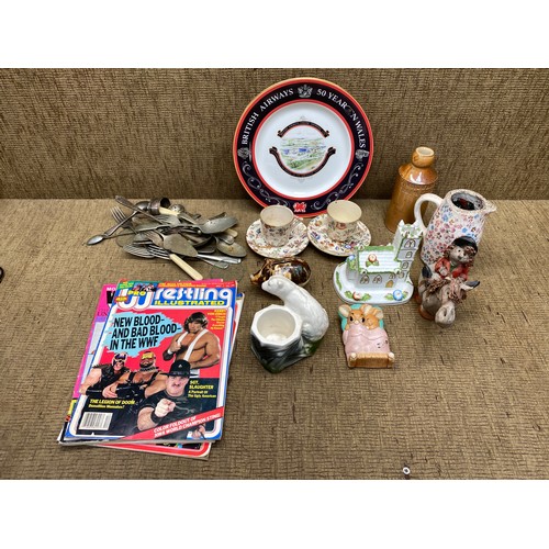 471 - Miscellaneous items including wrestling magazines, coal port village church and a British airways pl... 