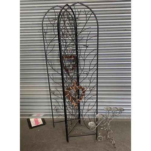 192 - Metal frame garden patio decoration candle holder and a candle stick frame.