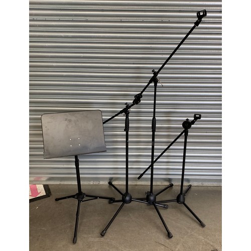 193 - 3 TourTech microphone stand and a sheet music stand.