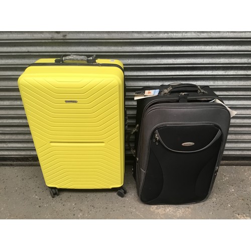 226 - Yellow suitcase and a set of LEEKS senior smart wheel suitcases (three set) with new labels.