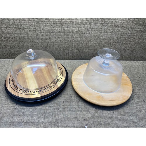 263 - 2 large cheese dishes with glass domes.