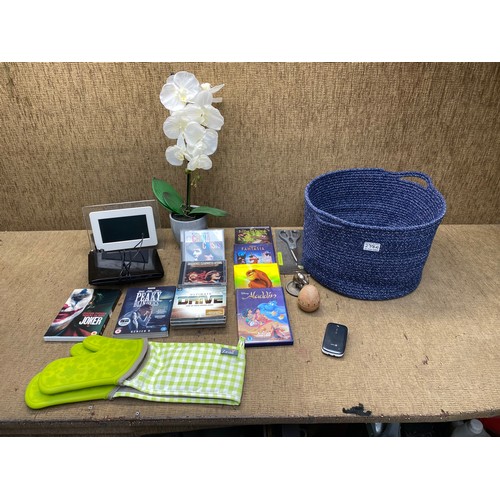 238A - Mixed items including dvds, digital photo frame.