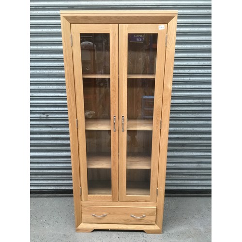 168A - 3 shelf’s and 1 draw Solid oak glass display cabinet 68x182cm.