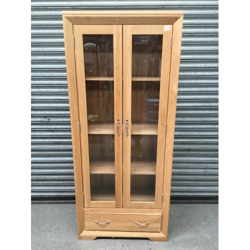 168B - 3 shelf’s and 1 draw Solid oak glass display cabinet 68x182cm.