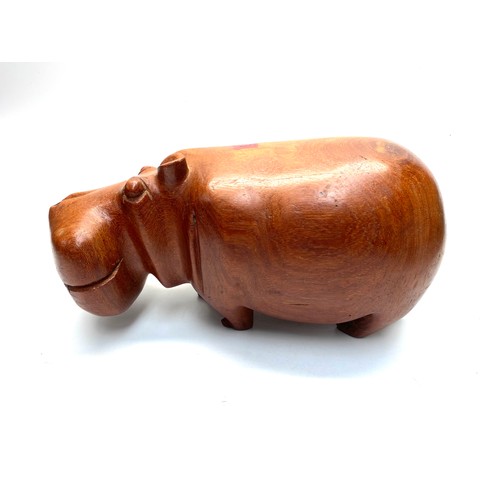 633 - Large hand carved wooden hippopotamus.