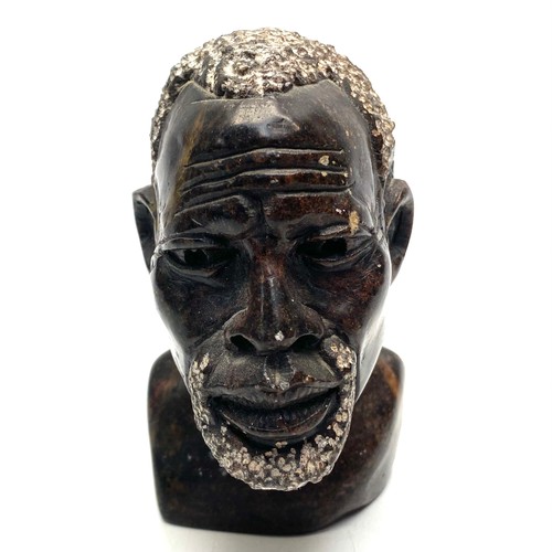 637 - Ornamental marble bust of an African man.