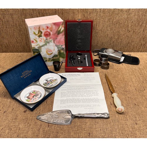 480 - Royal Worcester boxed set with letter from Kay and Company, napkin rings and bottle opener in a box.