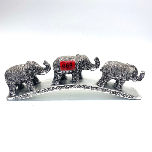 668 - 3 chromed resin Asian elephants (Possibly Indian).