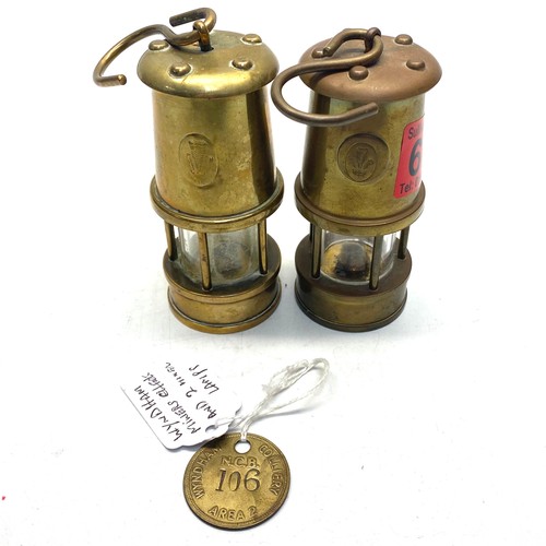 676 - 2 miniature miner lamps and 1 miner tally from Wyndam colliery.