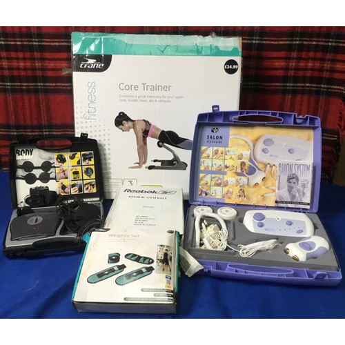 63 - Quantity of fitness gear including core trainer and ab massager