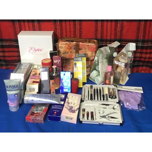 73 - A quantity of beauty products including perfumes