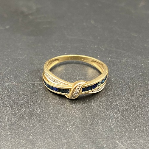 806 - 9ct Gold bow Ring. Size O. 1.9g