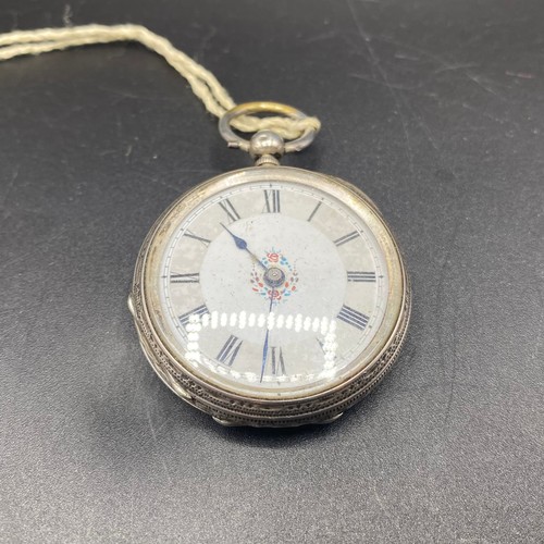 822 - American silver ladies pocket watch, with key working.