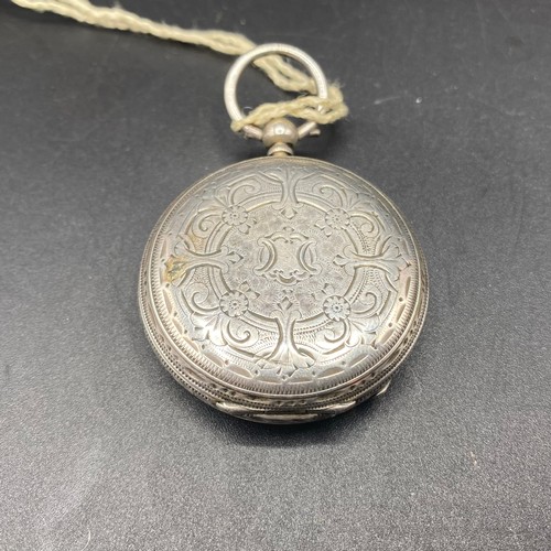 822 - American silver ladies pocket watch, with key working.