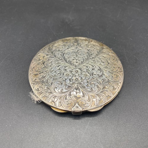 824 - Stunning 800 silver (USA) chased  ladies compact with gold gilt to the inside.