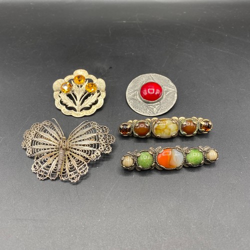 828 - Two Agate long brooch's one by miracle, Pewter Scottish brooch, and thistle and a  filigree butterfl... 