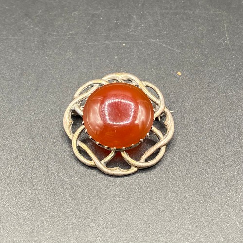 710 - Sterling silver and carnelian Scottish brooch.