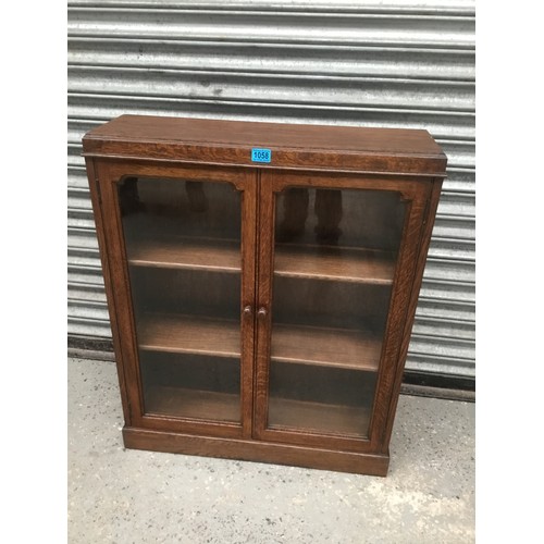 1058 - Oak glazed bookcase 93cm x 75cm