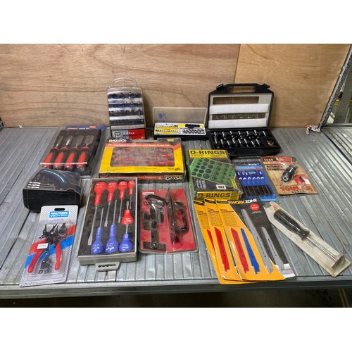 103 - Retailed package tools including screwdrivers, chisels, router bits.