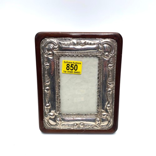 850 - Classic mahogany and silver arts and craft picture frame. 20x16cm