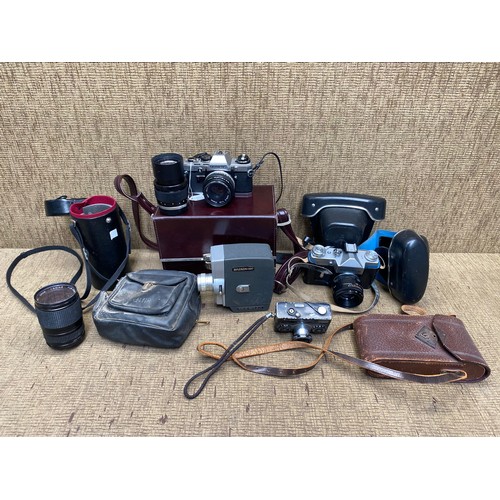 1062 - Mixed selection of cameras including Olympus om10 and a zenit-b.